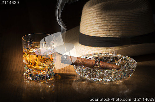 Image of Whiskey and cigar