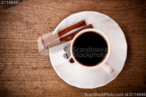 Image of cup of coffee and cinnamon