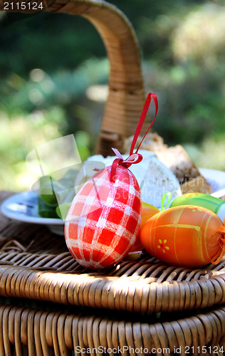 Image of Easter basket and colored eggs