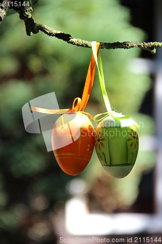 Image of Easter eggs hanging on the tree 