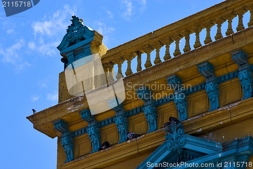 Image of  old blue yellow little terrace  and roof  