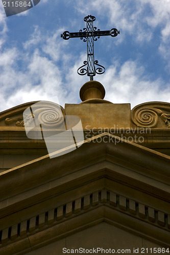 Image of  cross at top in old church of buenos aires 