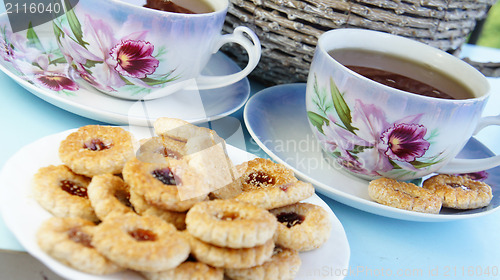 Image of Tea time with cookies 