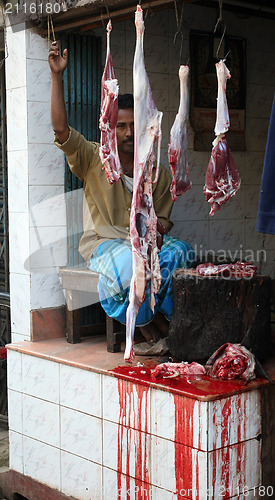 Image of Butcher and his stall at the market in India