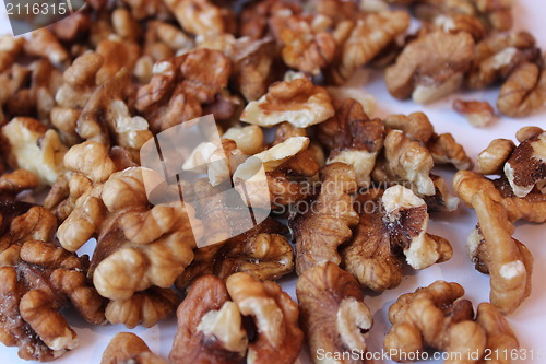 Image of a heap of ripe seeds of walnuts