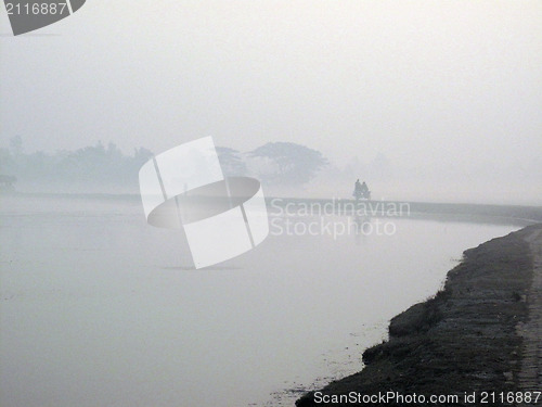 Image of A stunning sunrise looking over the holiest of rivers in India. Ganges delta in Sundarband, West Bengal, India.