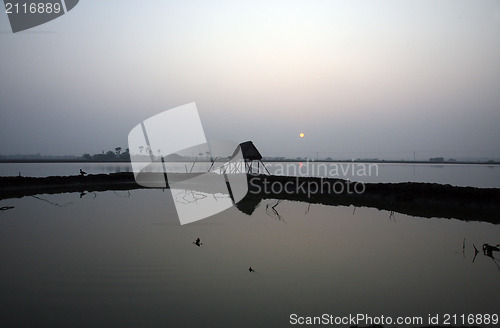 Image of A stunning sunrise looking over the holiest of rivers in India. Ganges delta in Sundarband, West Bengal, India.