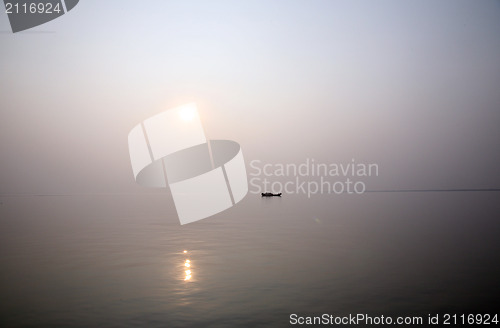 Image of A stunning sunset looking over the holiest of rivers in India. Ganges delta in Sunderbands, West Bengal, India