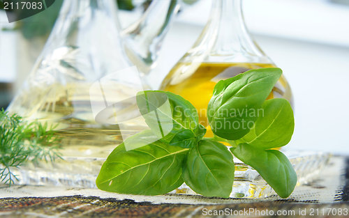 Image of Olive oil, vinegar and basil 