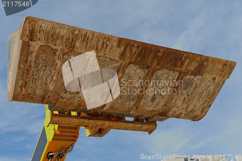 Image of Bulldozer excavation scoop on sky background