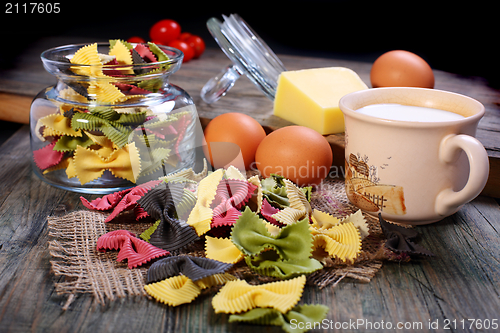 Image of Pasta,eggs,cheese and cream.