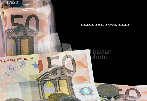Image of A few of  Euro bank notes.