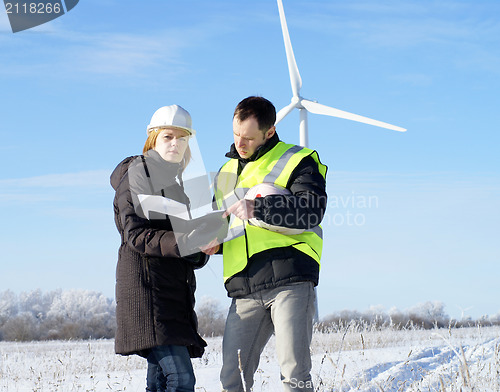 Image of team og engineers with wind turbines