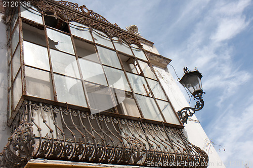 Image of Damaged wrought iron veranda.