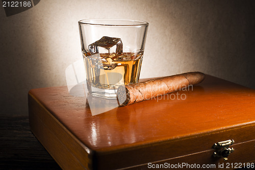 Image of Whiskey and cigar