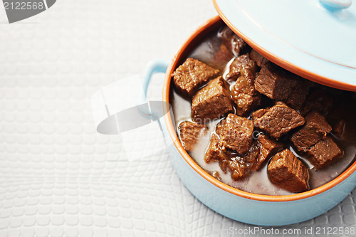 Image of goulash with beef and beer