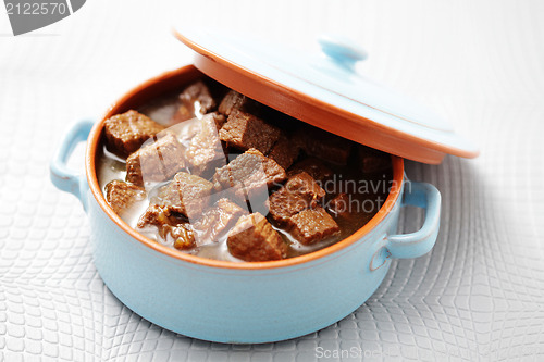 Image of goulash with beef and beer