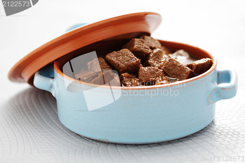 Image of goulash with beef and beer