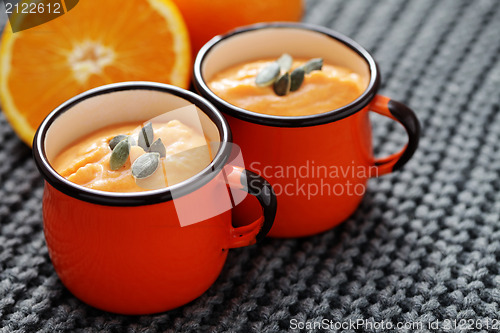 Image of pumpkin soup with orange