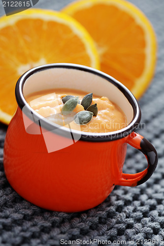 Image of pumpkin soup with orange