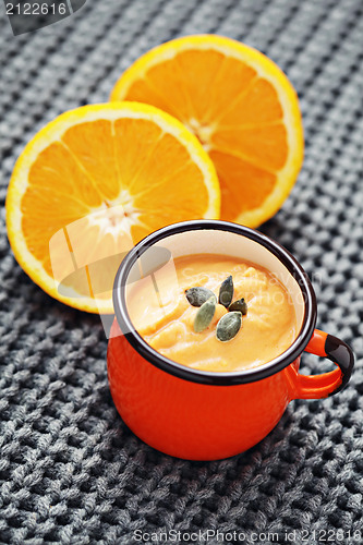 Image of pumpkin soup with orange