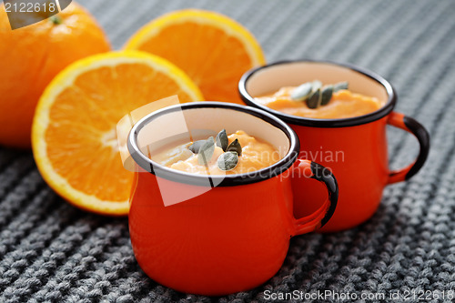 Image of pumpkin soup with orange