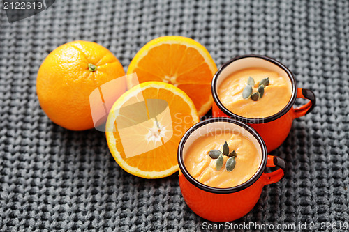 Image of pumpkin soup with orange