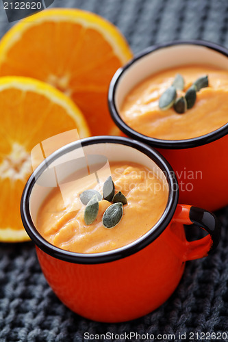 Image of pumpkin soup with orange