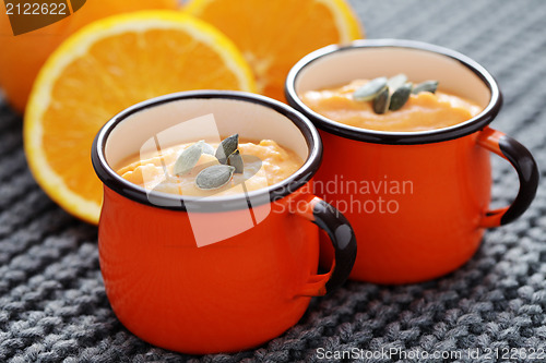 Image of pumpkin soup with orange