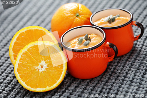 Image of pumpkin soup with orange