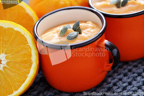 Image of pumpkin soup with orange