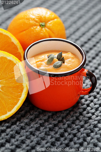 Image of pumpkin soup with orange