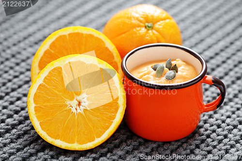 Image of pumpkin soup with orange