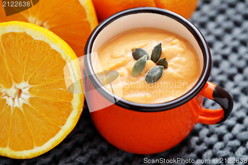 Image of pumpkin soup with orange