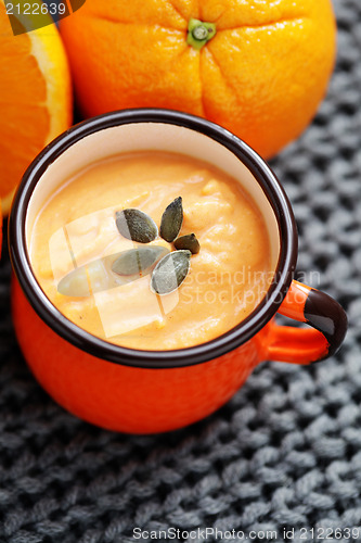 Image of pumpkin soup with orange