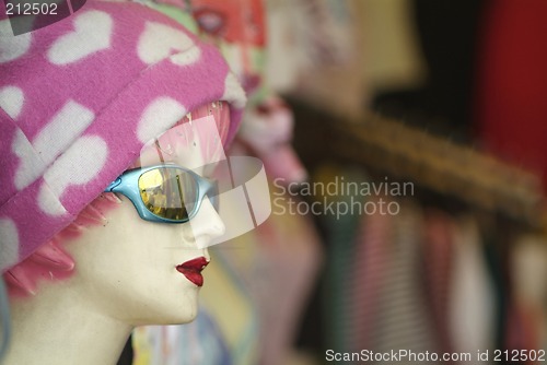Image of Worn mannequin with pink cap