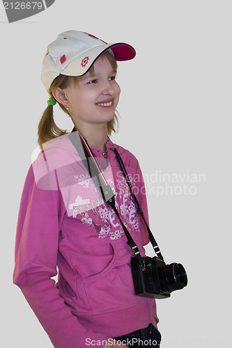 Image of Smiling girl with a camera