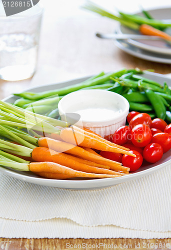 Image of Fresh vegetables with dipping sauce