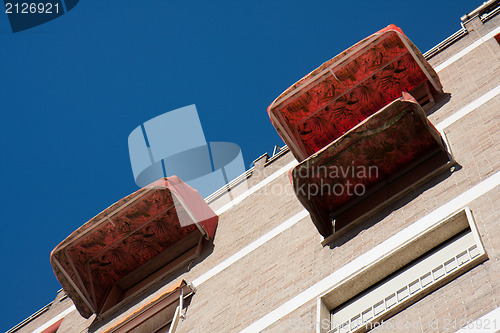 Image of Three big awnings on a facade