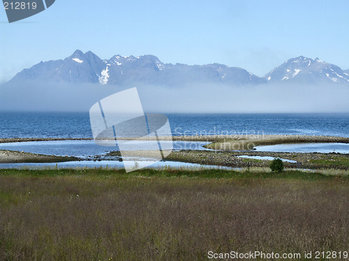 Image of Mountains in the mist by the seaside