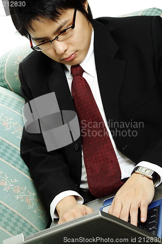 Image of Working businessman