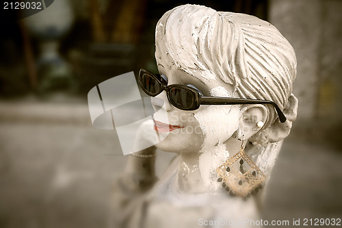 Image of Antique girl mannequin