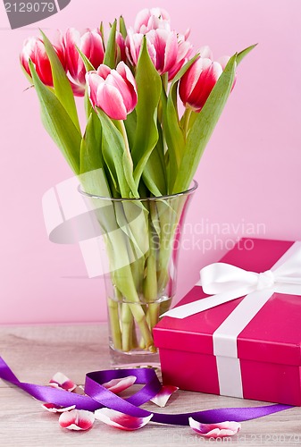 Image of pink and white tulips present ribbon easter birthday