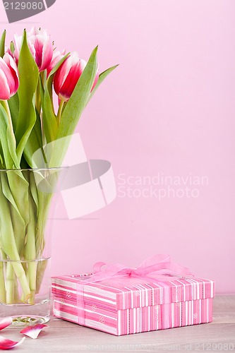 Image of pink and white tulips present ribbon easter birthday