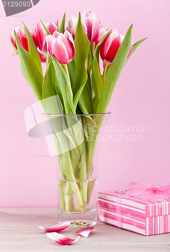 Image of pink and white tulips present ribbon easter birthday