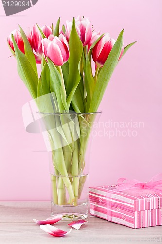 Image of pink and white tulips present ribbon easter birthday