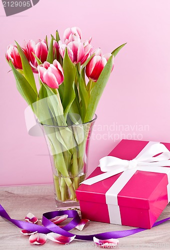 Image of pink and white tulips present ribbon easter birthday