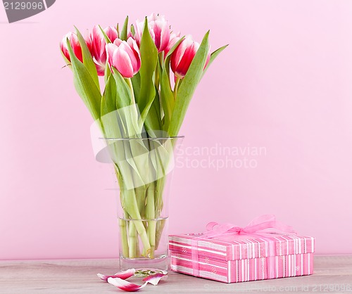 Image of pink and white tulips present ribbon easter birthday