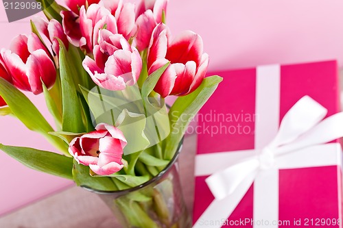 Image of pink and white tulips present ribbon easter birthday