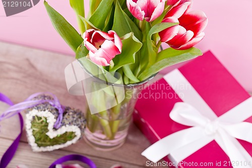 Image of pink and white tulips present ribbon easter birthday